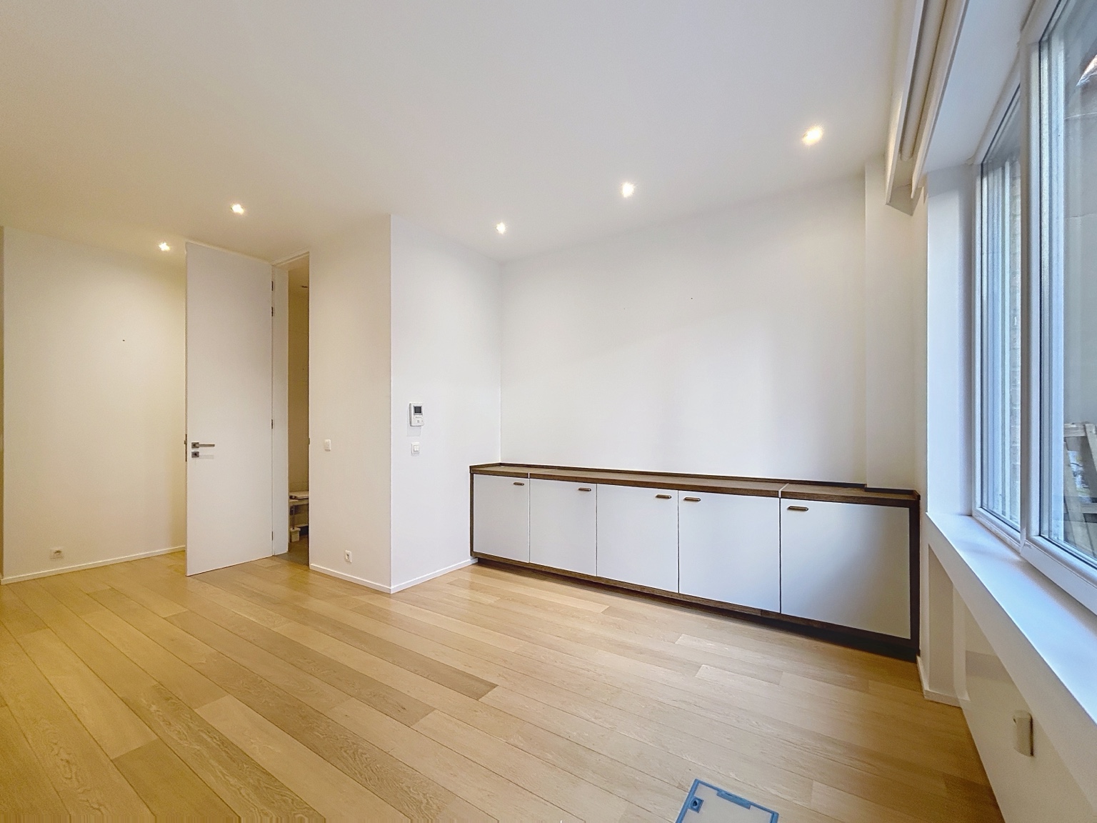 Espace de vie du studio Avenue Louise